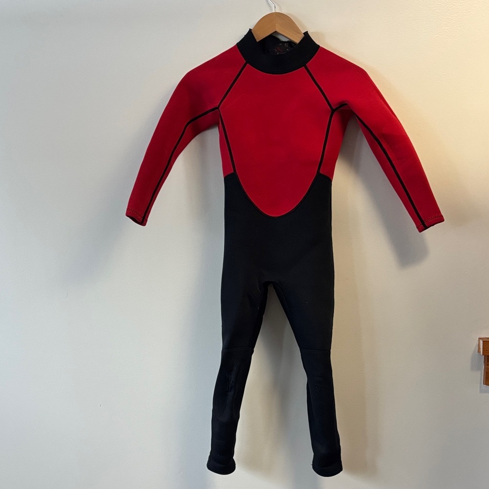 Real on Red and Black Full-Body Wetsuit kids size L (8-10)